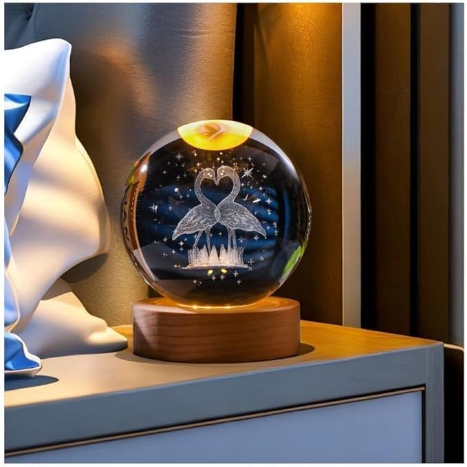 Flamingo crystal ball night lamp showing a flamingo standing among reeds laser-engraved inside the crystal